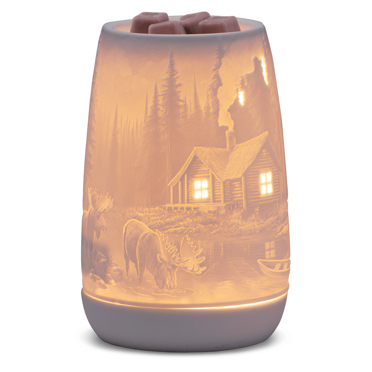 Wax warmer with a scenic design of a cabin and nature on a white background
