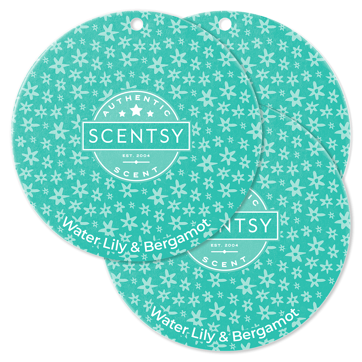 Two Scentsy scent discs with a floral pattern on a green background