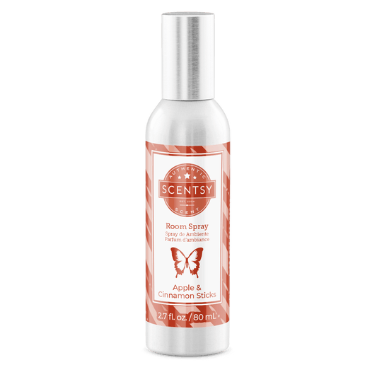 Scentsy room spray bottle with a red label on a white background