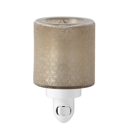 Decorative night light with textured beige shade on a green background