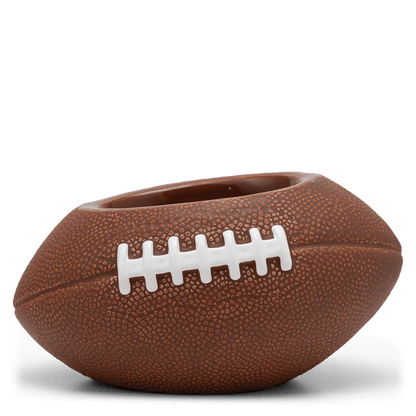 Football-shaped planter on a black base with a white background
