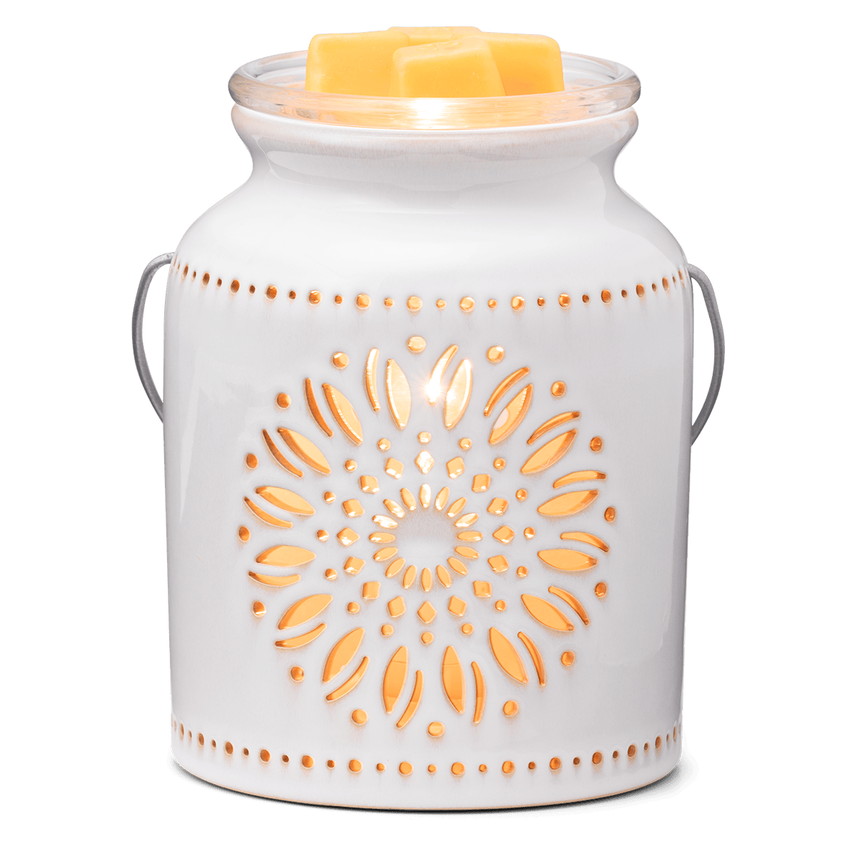 White ceramic warmer with decorative patterns on a white background