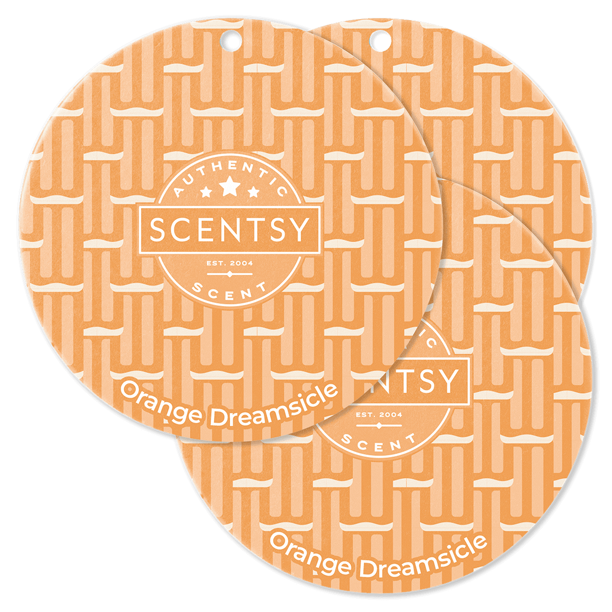 Two Scentsy Orange Dreamsicle scented wax melts on a green background
