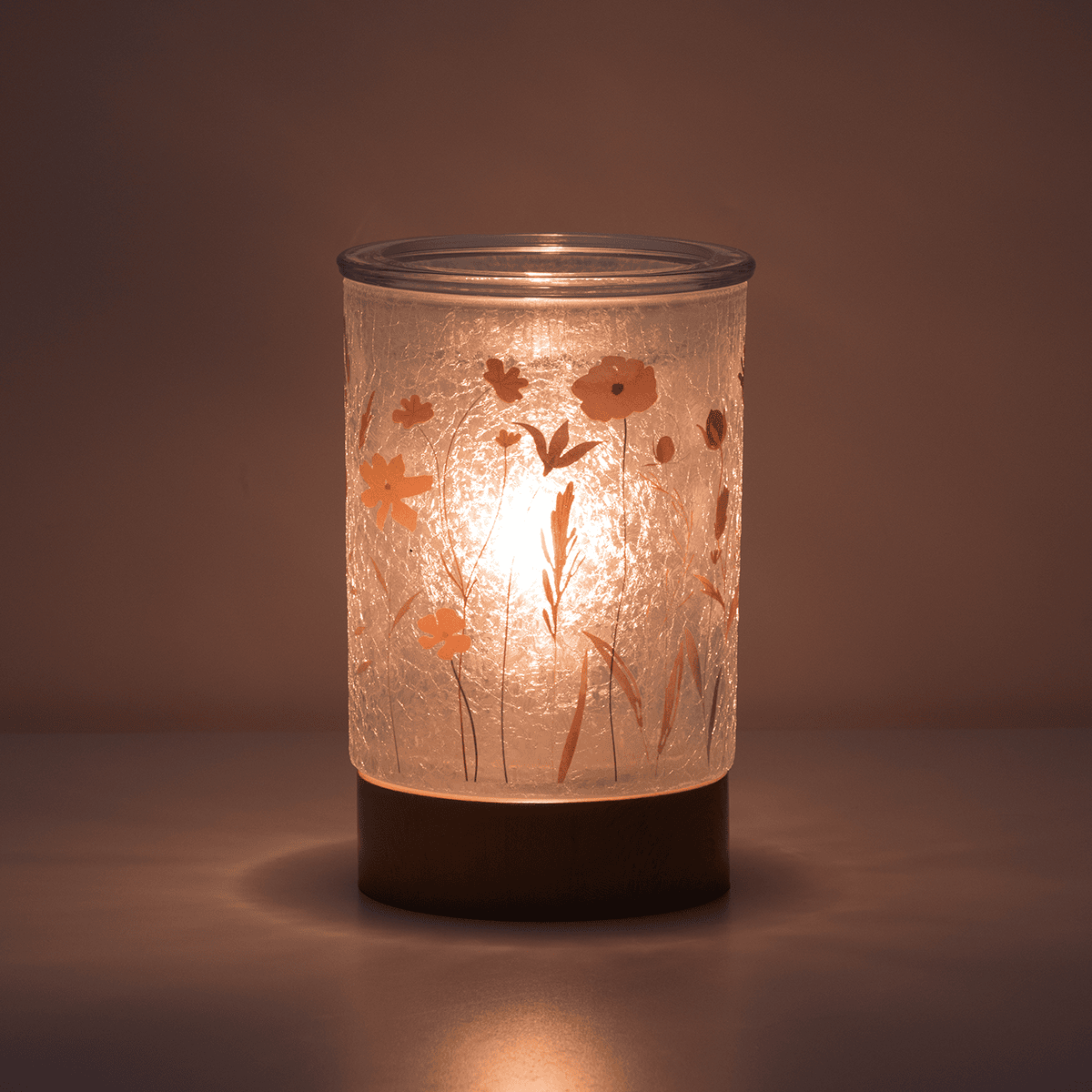 Decorative lamp with floral patterns on a brown background