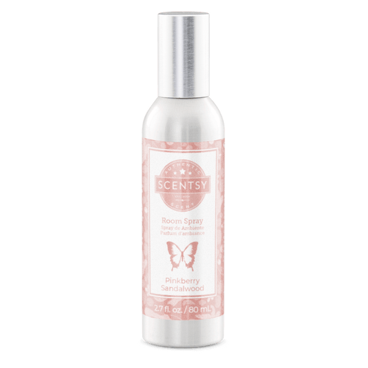Scentsy room spray bottle with pink label on a white background