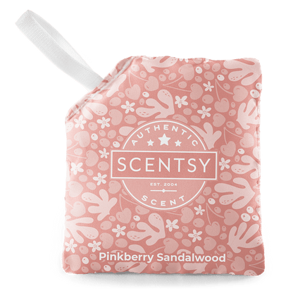 Scentsy Pinkberry Sandalwood scented wax bar with floral pattern on a green background