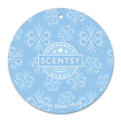 Scentsy Polar Bear Hug scent disc with snowflake pattern on a blue background