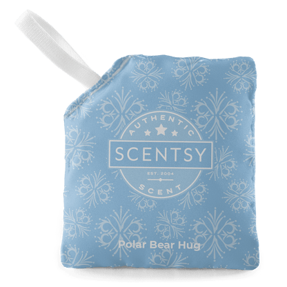 Scentsy Polar Bear Hug product with blue packaging and white handle on a black background