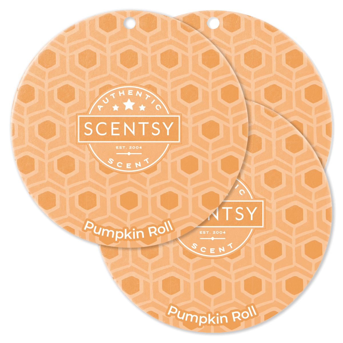 Two Scentsy Pumpkin Roll scented wax melts with hexagonal pattern on a black background