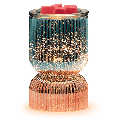 Decorative candle holder with rose gold base and blue glass on a white background