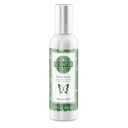 Scentsy room spray bottle with green label on a white background