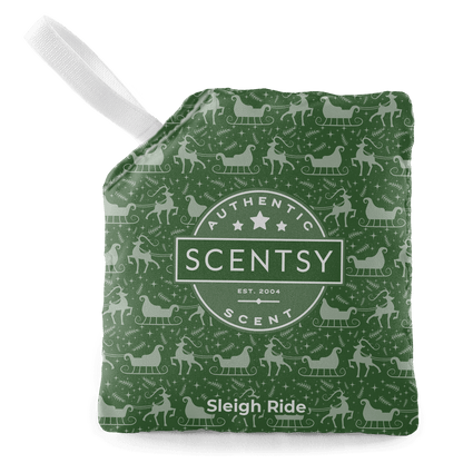 Scentsy Sleigh Ride scent pouch with a white handle on a black background