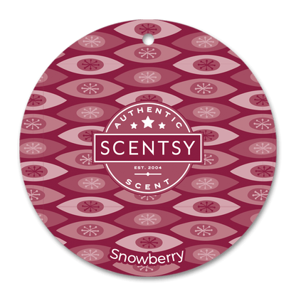 Scentsy Snowberry scent disc with patterned design on a black background