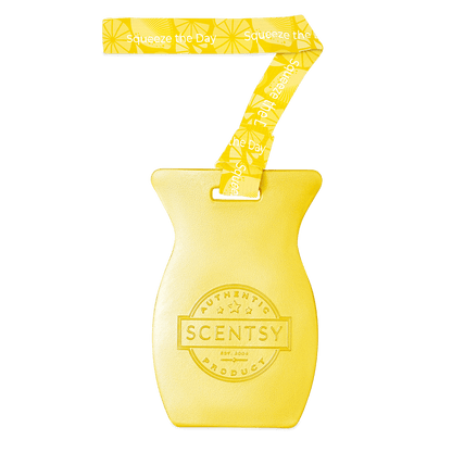 Yellow Scentsy product with a band on a black background