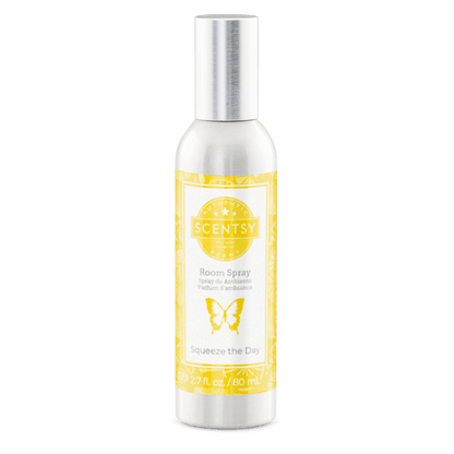 Scentsy room spray bottle with yellow label on a white background