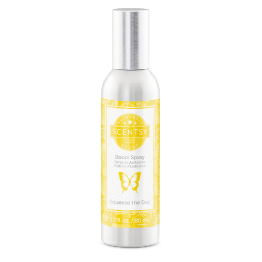 Scentsy room spray bottle with yellow label on a white background