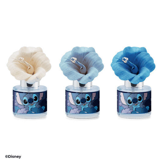 Three cartoon character-themed air fresheners with different colored flowers on a black background.