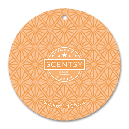 Scentsy Sunkissed Citrus scent disc with geometric pattern on a black background