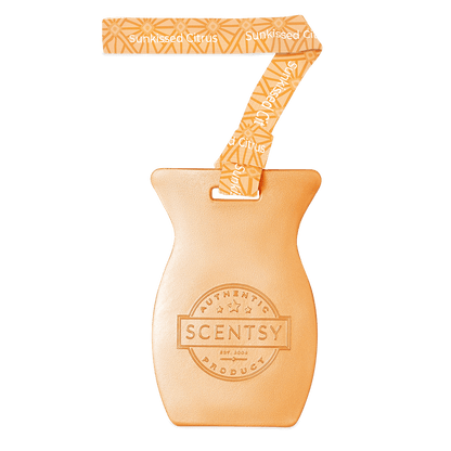 Scentsy product with a decorative ribbon on a black background