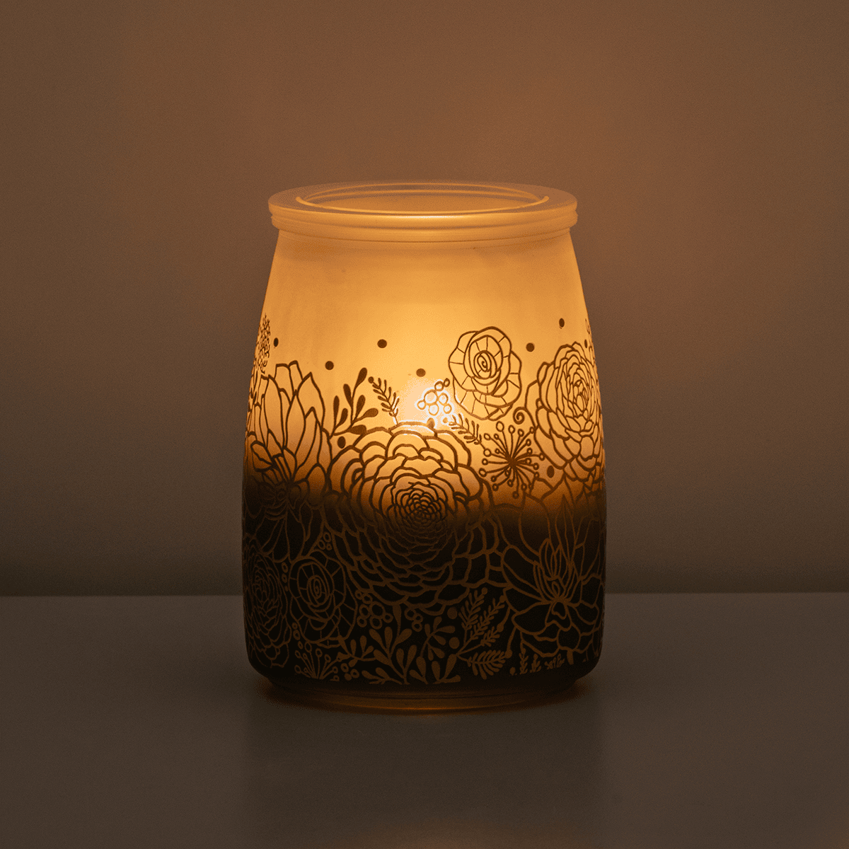 Decorative lantern with floral patterns on a dark background