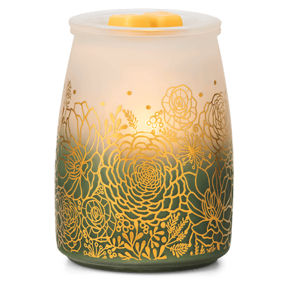 Decorative wax warmer with floral patterns on a white background