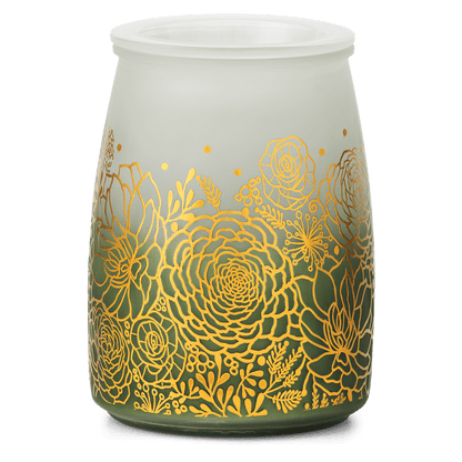 Decorative wax warmer with gold floral patterns on a white background