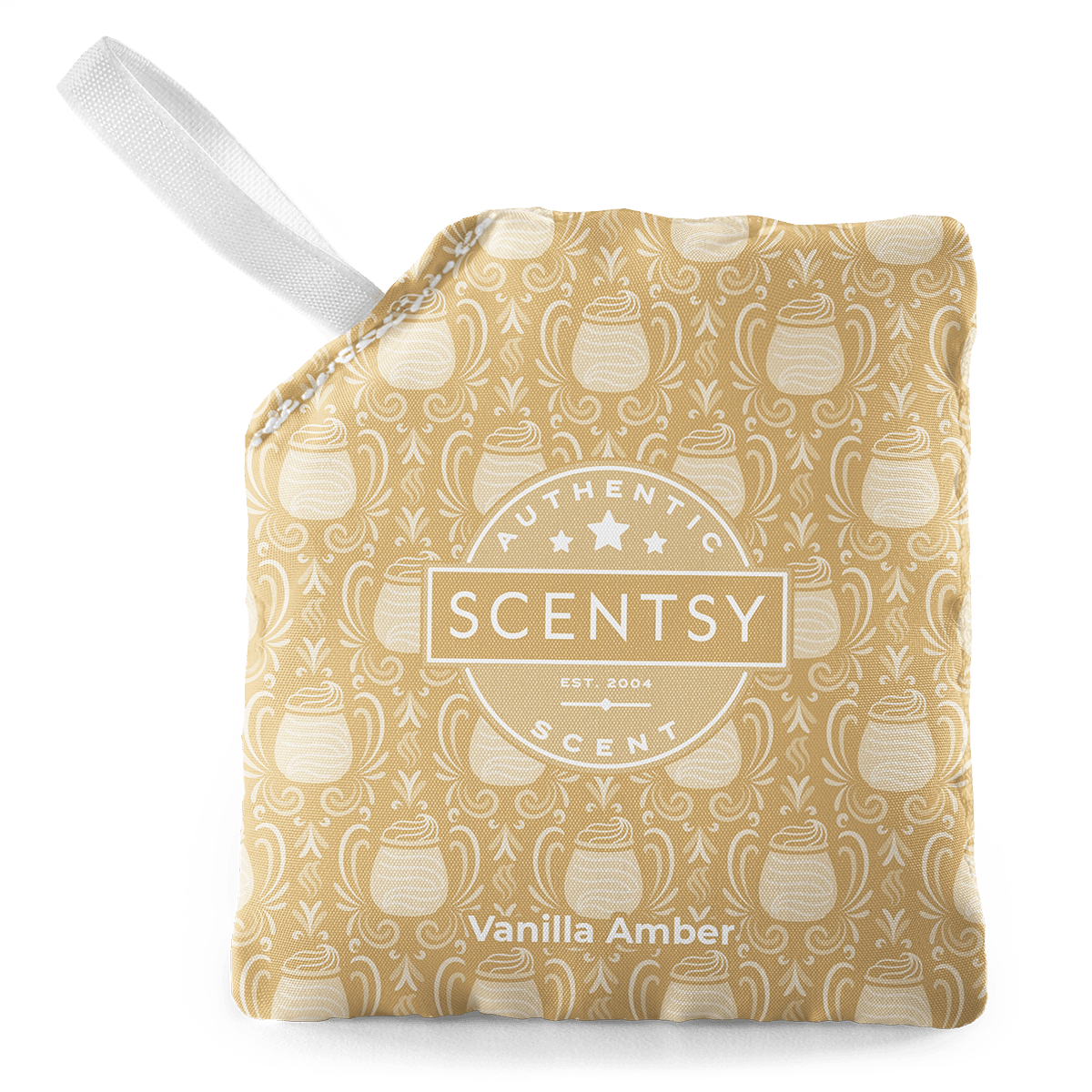 Scentsy Vanilla Amber warmer with a white handle on a green background