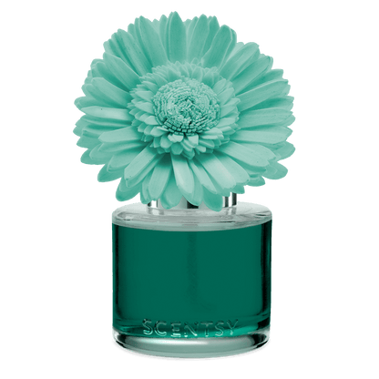 Scentsy diffuser with a large turquoise flower on a black background