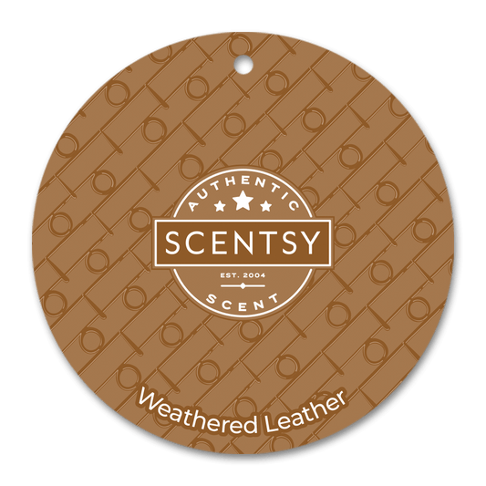 Scentsy Weathered Leather scent disc with brand logo on a brown background