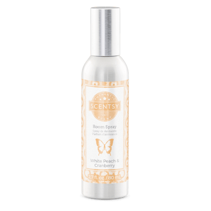 Scentsy room spray bottle with white peach and cranberry scent on a white background