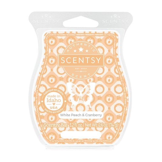 Scentsy bar packaging with white peach and cranberry design on a black background