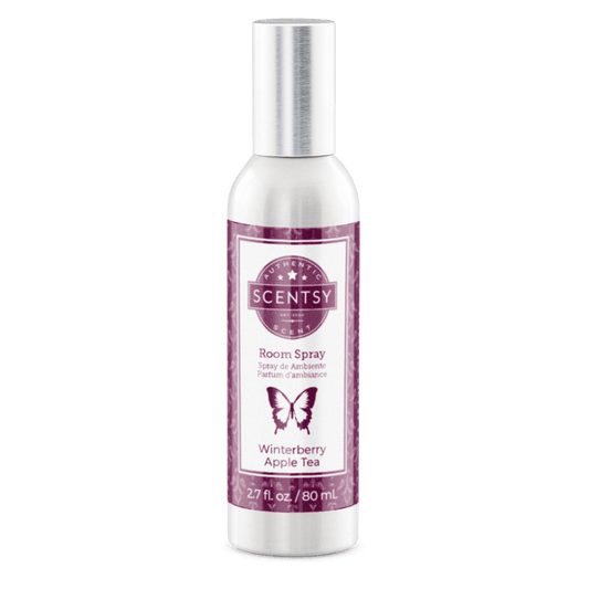 Scentsy room spray bottle with purple label on a white background