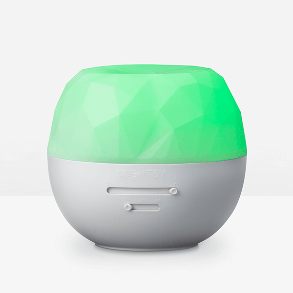 Round device with green top and gray bottom on a white background