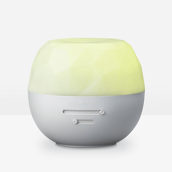Round device with green top and gray bottom on a white background
